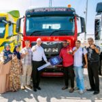 MAN Msia MD Andrew O’Brooks handing over a mock key to Artha Logistics director Viswanathan