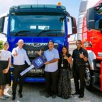 Transprompt Cargo MD Ajeet Singh receiving a mock key from MAN Msia MD Andrew O’Brooks for his company’s new MAN TGS 4×2